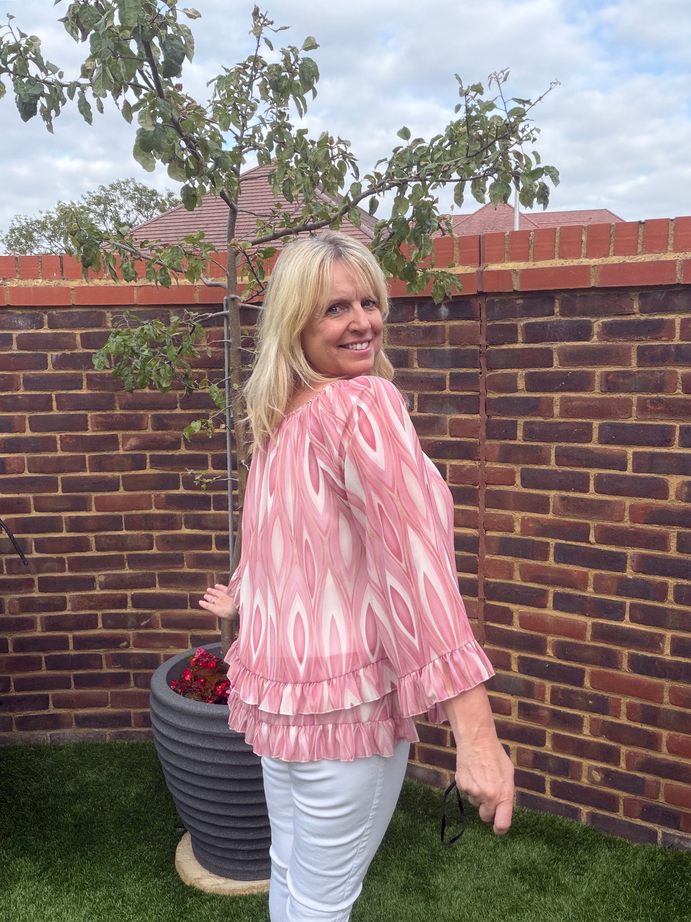 SADIE – Swirl Long sleeve tiered hem blouse