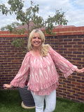 SADIE – Swirl Long sleeve tiered hem blouse